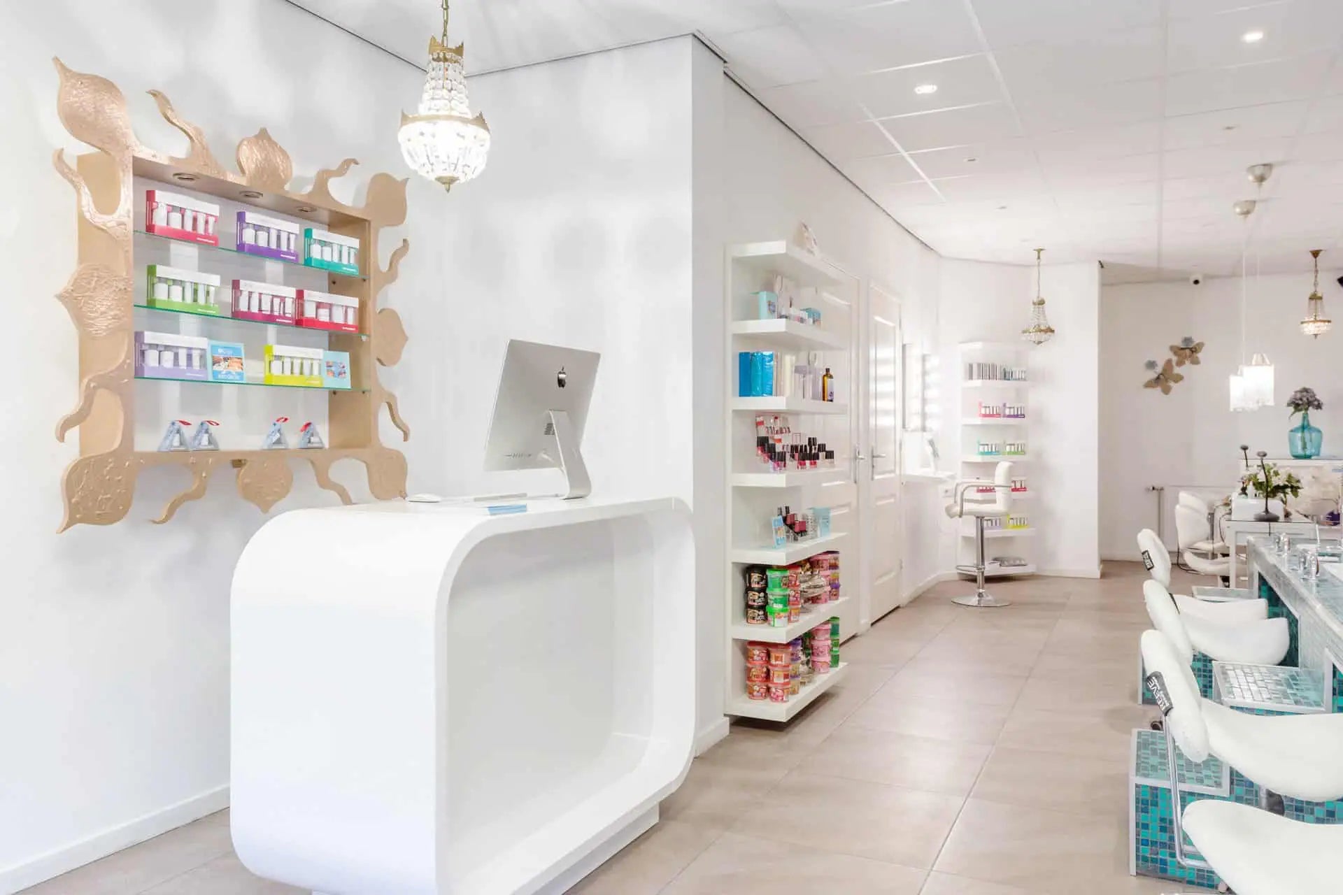 Modern interior of a store with a reception desk and shelves.